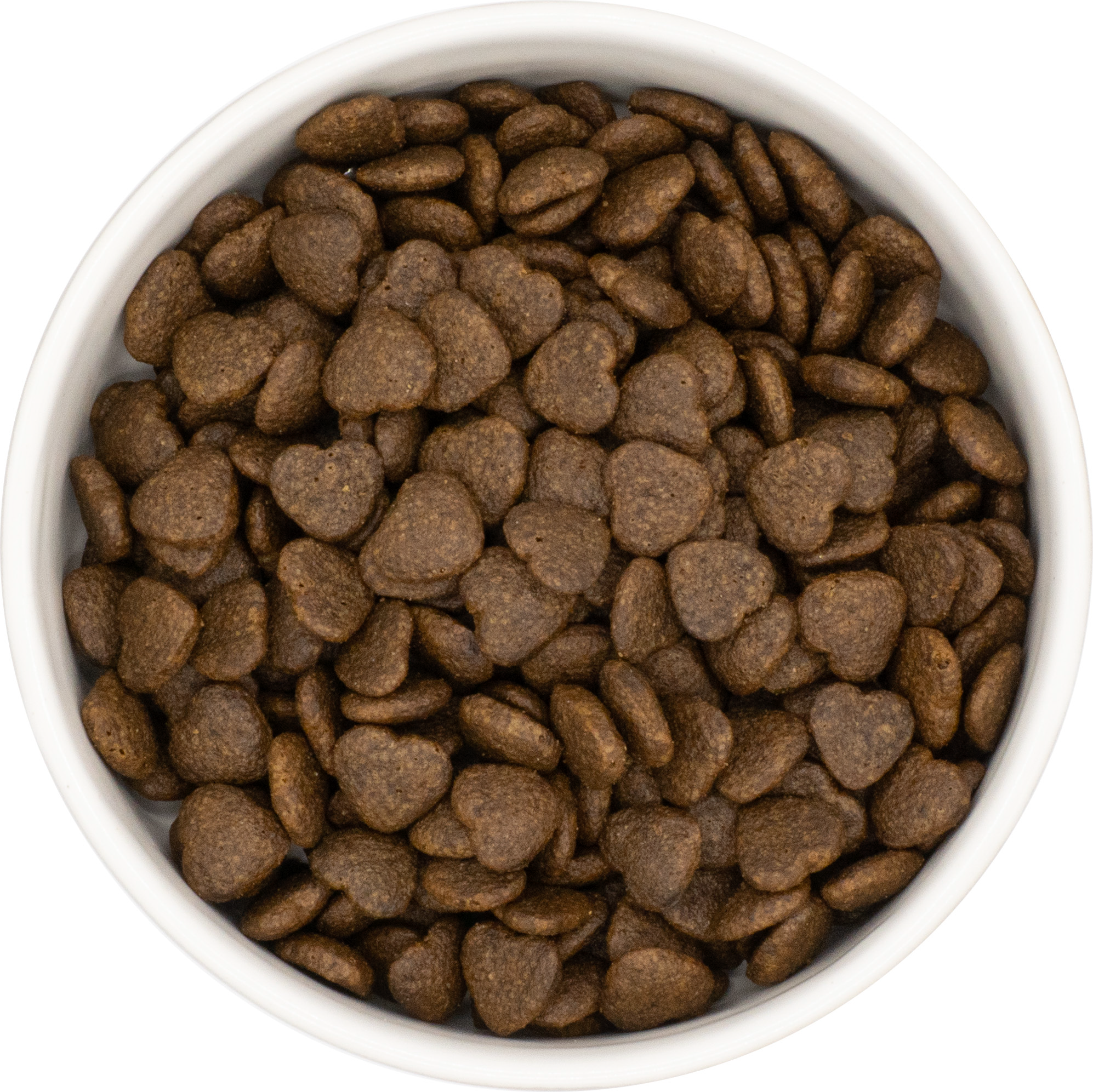 White bowl filled with brown heart-shaped McDug Health and wellness dog food on a white background